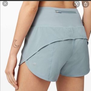Lululemon blue cast speed up shorts sz 8 4in